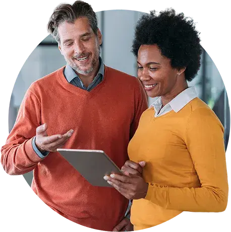 Small business owners comparing health insurance plans for their employees