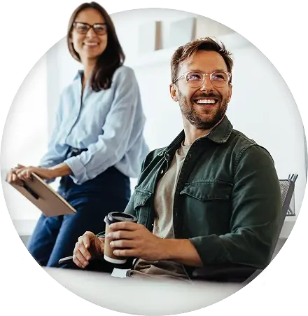 Smiling employees in a business meeting