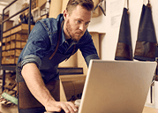 Man reviewing open enrollment dates and health insurance options, preparing for ACA marketplace enrollment period deadlines